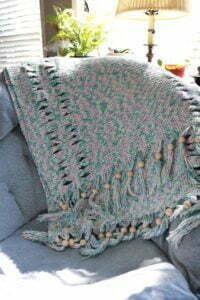 crochet throw on a chair