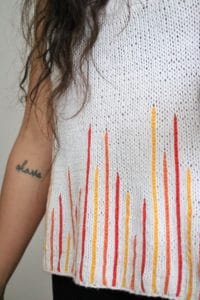 vertical stripes on a white knitted top