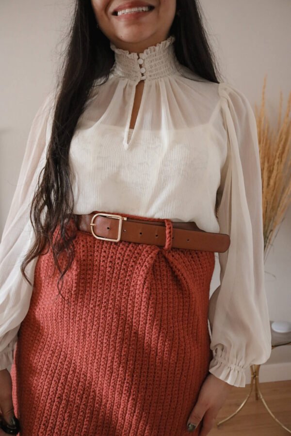 girl wearing a pleated crochet skirt